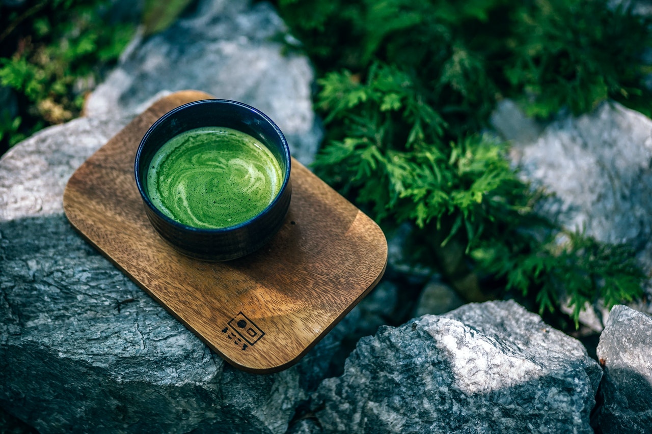 green liquid in cup